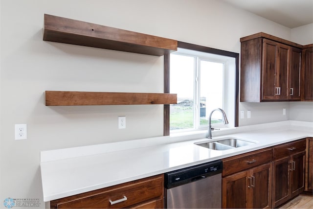 405 16th St NE, Dilworth, MN 56529 - kitchen with dishwasher, a sink, open shelves, and light countertops