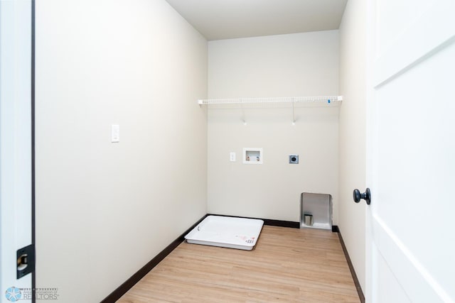 405 16th St NE, Dilworth, MN 56529 - laundry room featuring hookup for an electric dryer, light wood-style floors, hookup for a washing machine, and baseboards