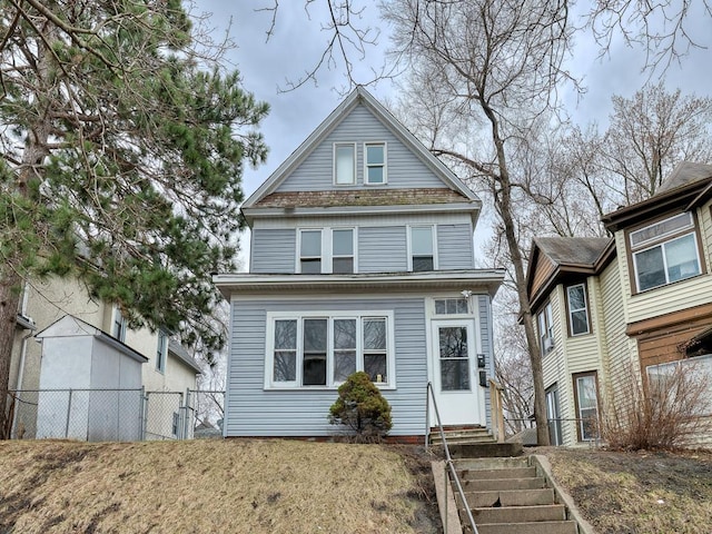 818 Edmund Ave, Saint Paul, MN 55104 - american foursquare style home with entry steps and a gate