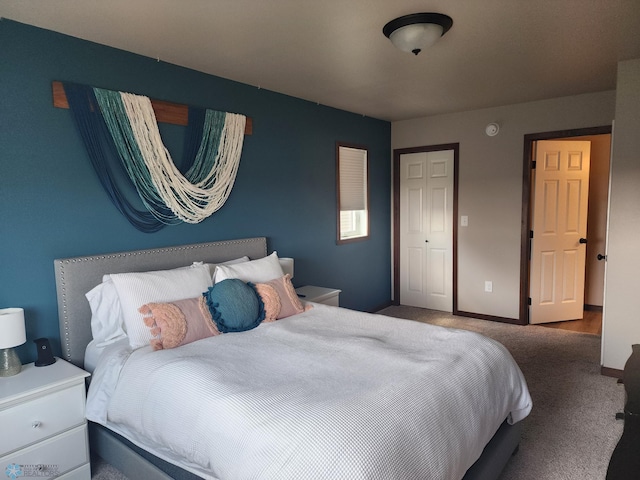 1743 46th Ave S, Moorhead, MN 56560 - bedroom with carpet, baseboards, and a closet
