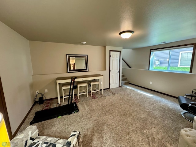 1743 46th Ave S, Moorhead, MN 56560 - living area with baseboards, stairway, and carpet flooring