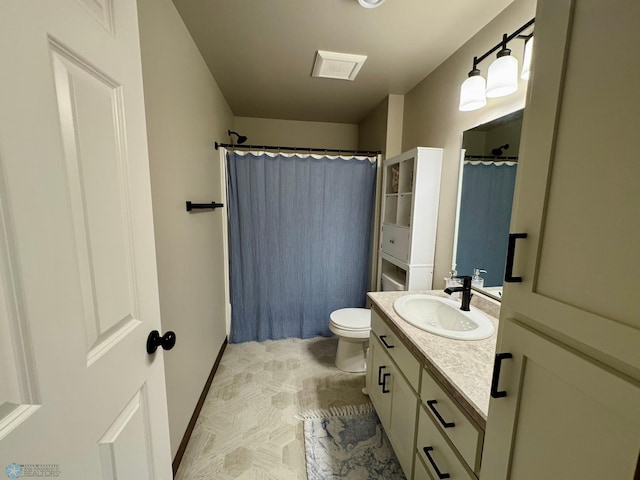 1743 46th Ave S, Moorhead, MN 56560 - bathroom with vanity, toilet, curtained shower, and baseboards