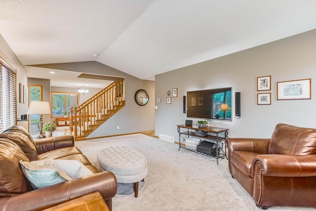 38 Jefferson Ct, Hastings, MN 55033 - living room with stairway, carpet flooring, lofted ceiling, a chandelier, and baseboards