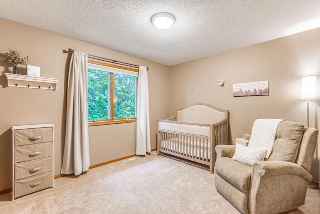 38 Jefferson Ct, Hastings, MN 55033 - bedroom with light colored carpet, a textured ceiling, and baseboards