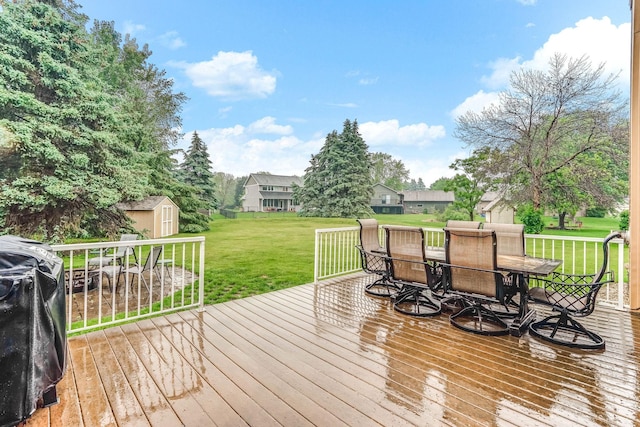 38 Jefferson Ct, Hastings, MN 55033 - wooden terrace with outdoor dining area and a yard