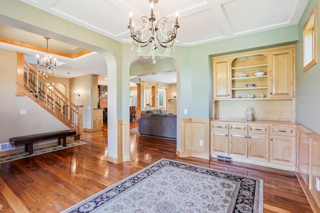 15758 Austin St NE, Ham Lake, MN 55304 - foyer with a chandelier, arched walkways, wood finished floors, stairs, and coffered ceiling