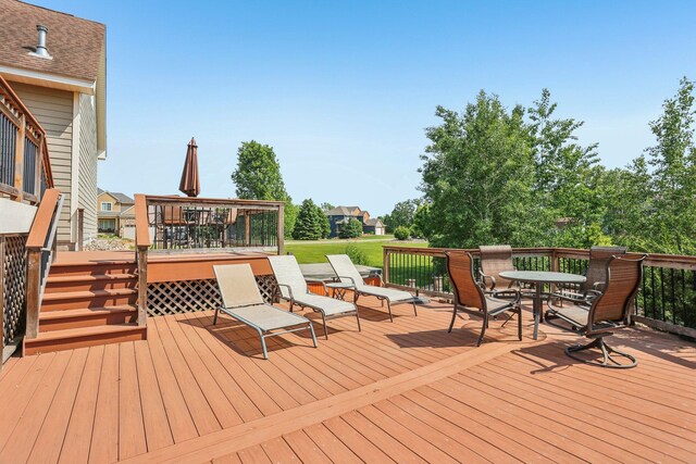15758 Austin St NE, Ham Lake, MN 55304 - wooden terrace with outdoor dining space