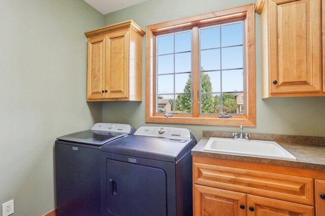 15758 Austin St NE, Ham Lake, MN 55304 - washroom featuring cabinet space and separate washer and dryer