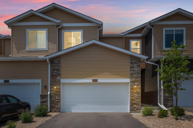 14834 Willemite Way NW, Ramsey, MN 55303 - view of front of property with stone siding and driveway