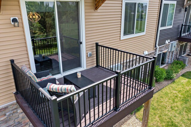 14834 Willemite Way NW, Ramsey, MN 55303 - wooden terrace featuring central AC