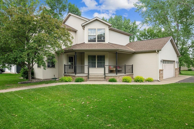 901 14th St N, Sartell, MN 56377 - view of front of property featuring covered porch, a garage, concrete driveway, and a front yard