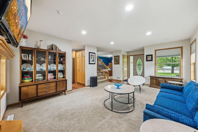 901 14th St N, Sartell, MN 56377 - living area with carpet, stairway, recessed lighting, and a textured ceiling