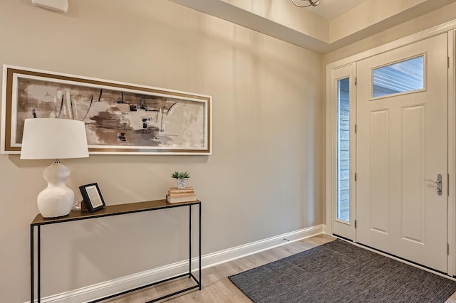 5054 Dale Ridge Rd, Woodbury, MN 55129 - foyer with wood finished floors and baseboards