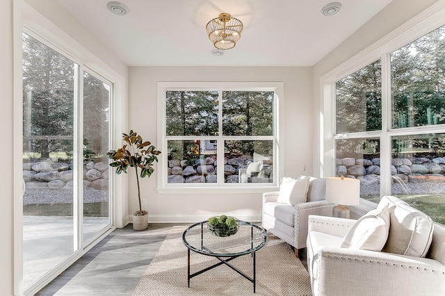5054 Dale Ridge Rd, Woodbury, MN 55129 - sunroom with plenty of natural light and a chandelier