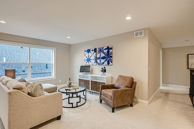 5054 Dale Ridge Rd, Woodbury, MN 55129 - living area featuring light carpet, baseboards, and recessed lighting