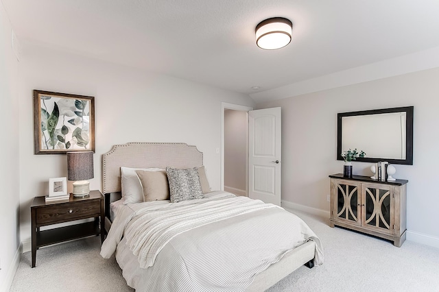 5054 Dale Ridge Rd, Woodbury, MN 55129 - bedroom with baseboards and light colored carpet