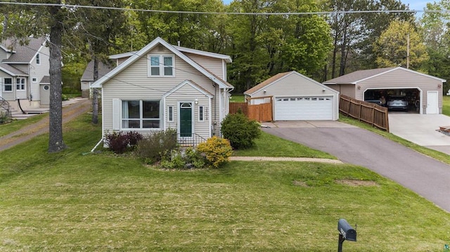 2508 Springvale Rd, Duluth, MN 55811 - view of front of house with a detached garage, an outbuilding, and view of wooded area