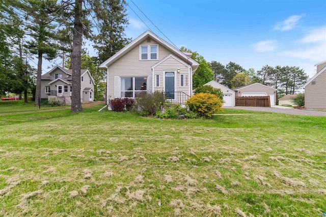 2508 Springvale Rd, Duluth, MN 55811 - bungalow featuring a front lawn and a detached garage