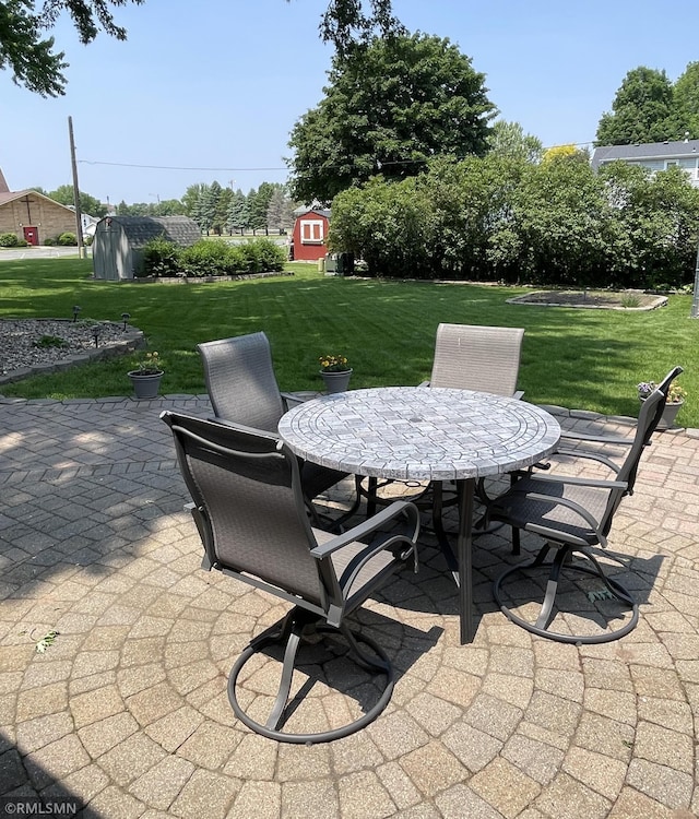 705 Turril St, Le Sueur, MN 56058 - view of patio featuring outdoor dining area