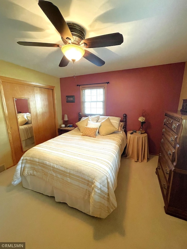 705 Turril St, Le Sueur, MN 56058 - bedroom featuring carpet, a closet, and a ceiling fan