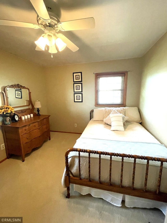 705 Turril St, Le Sueur, MN 56058 - bedroom featuring light colored carpet and a ceiling fan