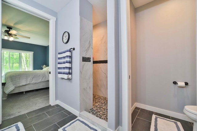 16460 Sanctuary Way, Brainerd, MN 56401 - ensuite bathroom featuring walk in shower, toilet, tile patterned flooring, a ceiling fan, and baseboards
