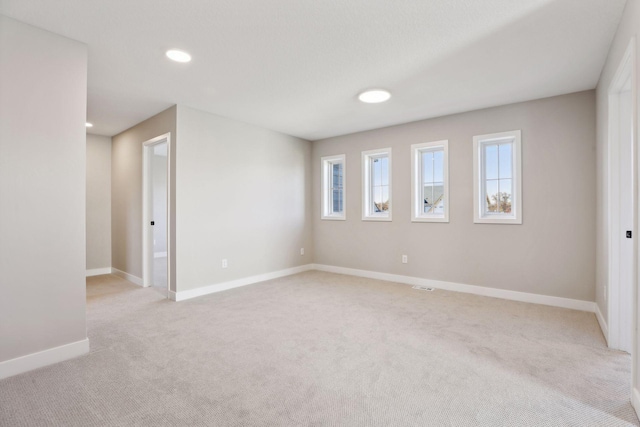 6135 Harkness Ln S, Cottage Grove, MN 55016 - empty room with light colored carpet and recessed lighting