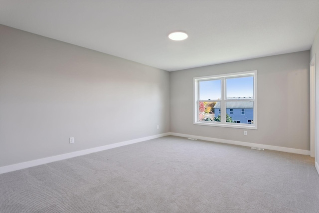 6135 Harkness Ln S, Cottage Grove, MN 55016 - spare room featuring carpet flooring