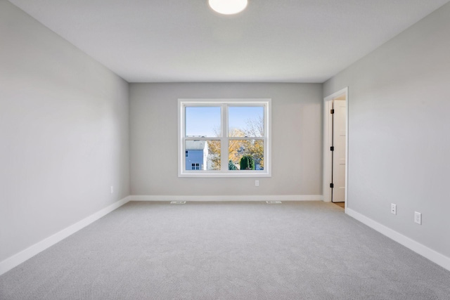 6135 Harkness Ln S, Cottage Grove, MN 55016 - carpeted empty room with baseboards