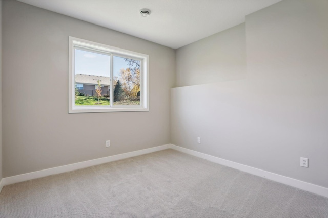 6135 Harkness Ln S, Cottage Grove, MN 55016 - unfurnished room with light carpet and a smoke detector