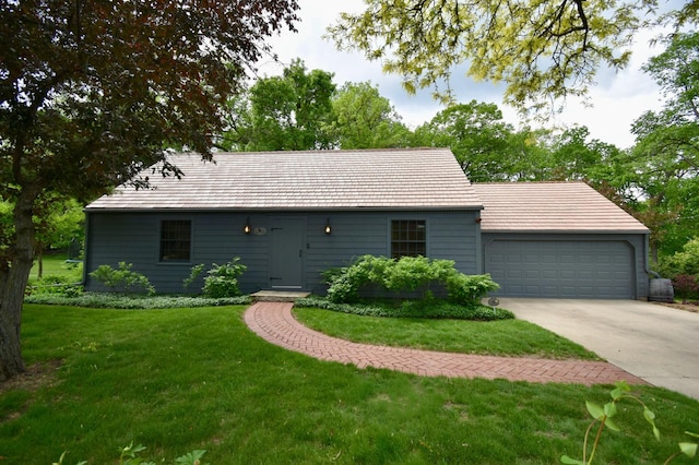 2645 Riverside Ln NE, Rochester, MN 55906 - single story home with driveway, a front yard, and a garage