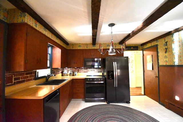 2645 Riverside Ln NE, Rochester, MN 55906 - kitchen featuring black appliances, a sink, wallpapered walls, a chandelier, and light countertops