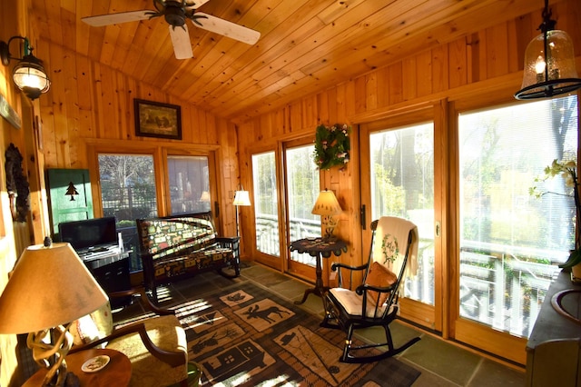 2645 Riverside Ln NE, Rochester, MN 55906 - sunroom / solarium with lofted ceiling, wood walls, wood ceiling, and tile patterned floors