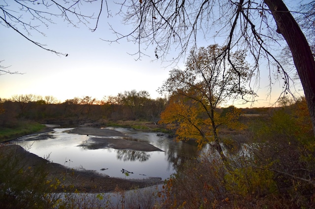 2645 Riverside Ln NE, Rochester, MN 55906 - water view featuring a forest