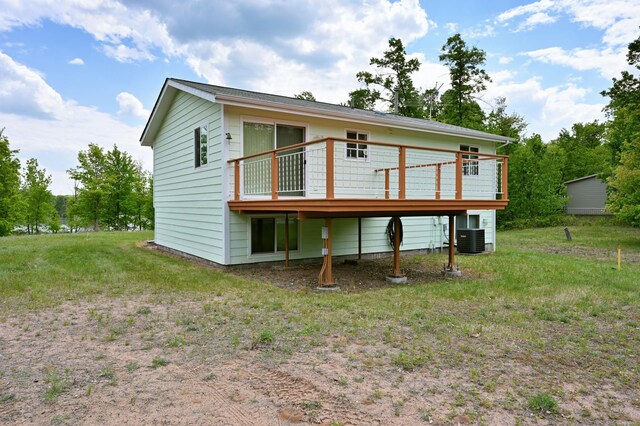 27681 Moser Dr, Jackson Twp, WI 54893 - back of property with a deck and central AC