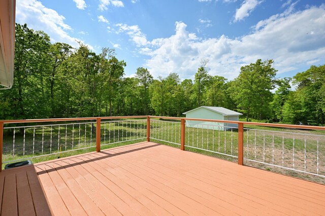 27681 Moser Dr, Jackson Twp, WI 54893 - deck featuring an outbuilding and a yard