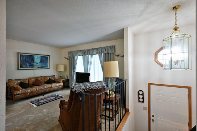27681 Moser Dr, Jackson Twp, WI 54893 - carpeted living room featuring a textured ceiling