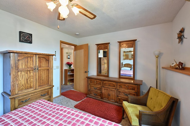 27681 Moser Dr, Jackson Twp, WI 54893 - carpeted bedroom with a textured ceiling and a ceiling fan