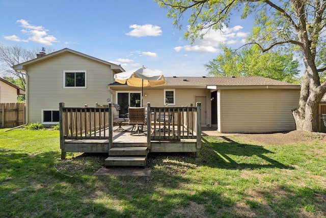 265 107th Ln NW, Coon Rapids, MN 55448 - rear view of house with a wooden deck