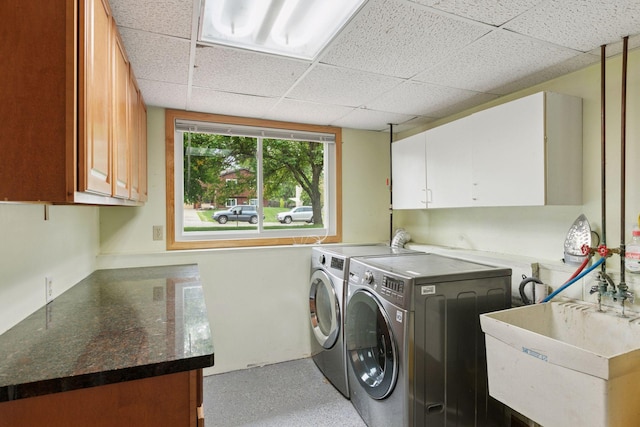 265 107th Ln NW, Coon Rapids, MN 55448 - laundry room with cabinet space and washer and dryer