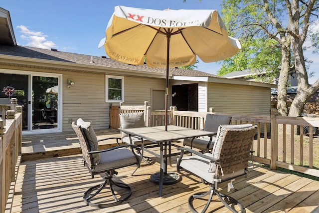 265 107th Ln NW, Coon Rapids, MN 55448 - wooden deck with outdoor dining area