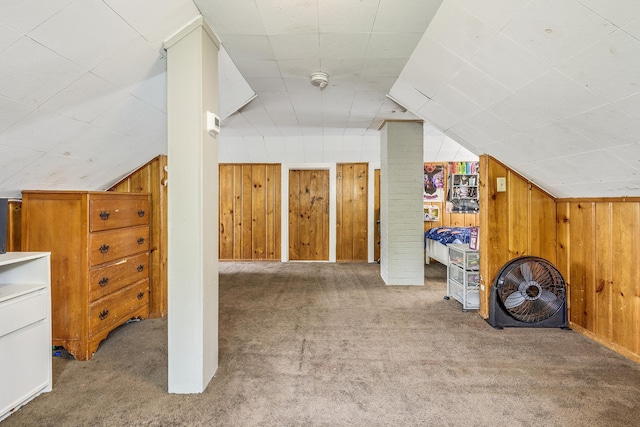 1167 Geranium Ave E, Saint Paul, MN 55106 - bonus room with carpet flooring, wooden walls, and lofted ceiling