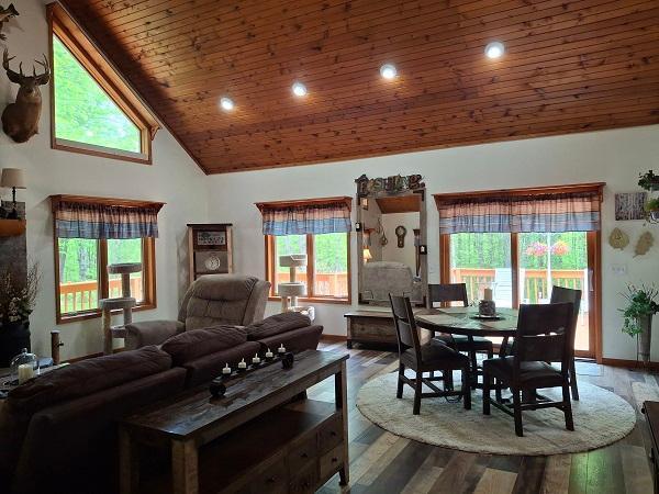 29805 Arbo Rd, Grand Rapids, MN 55744 - living room with wood ceiling, high vaulted ceiling, wood finished floors, baseboards, and recessed lighting