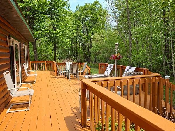 29805 Arbo Rd, Grand Rapids, MN 55744 - wooden terrace with outdoor dining area