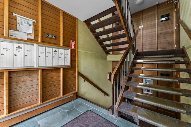 1405 40th St Unit 15F, Minneapolis, MN 55407 - staircase with mail area and tile patterned flooring