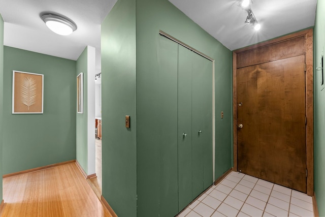 1405 40th St Unit 15F, Minneapolis, MN 55407 - hallway featuring baseboards and light wood-type flooring