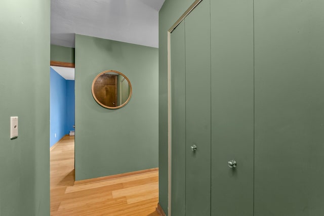 1405 40th St Unit 15F, Minneapolis, MN 55407 - hall featuring wood finished floors and baseboards