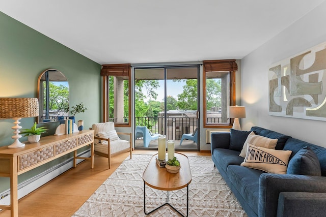 1405 40th St Unit 15F, Minneapolis, MN 55407 - living room featuring wood finished floors