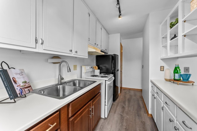 1405 40th St Unit 15F, Minneapolis, MN 55407 - kitchen with white range with electric cooktop, a sink, under cabinet range hood, and light countertops