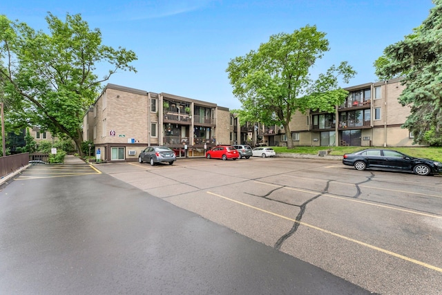 1405 40th St Unit 15F, Minneapolis, MN 55407 - uncovered parking lot with a residential view